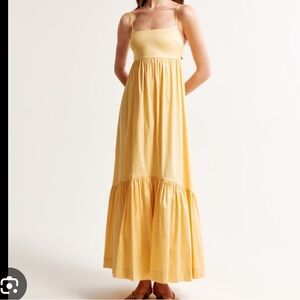 Drama bow back taffeta dress